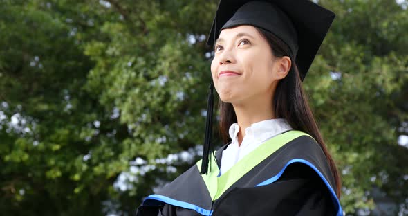 Woman Get Graduation in University Campus