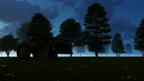 Tractor Working In The Field At Night