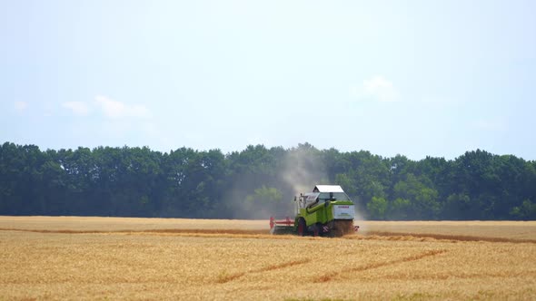 Harvester machine working in field