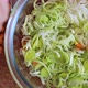 Mixing carrots and leeks in a bowl - VideoHive Item for Sale