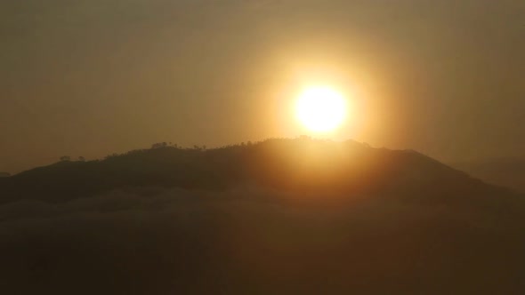 View of foggy sunrise on the Little Adam's Peak in Ella, Sri Lanka