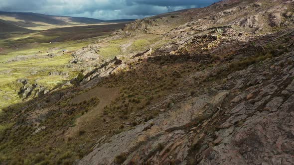 Flying over the incredible mountain landscape of the Andes Mountains in Bolivia. Cinematic drone lan