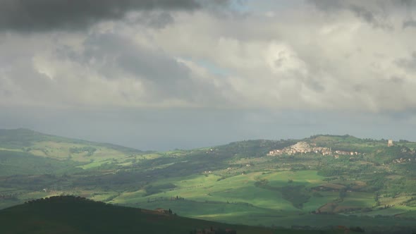 Shadows of Clouds Slide on Hills of Tuscany, Italy