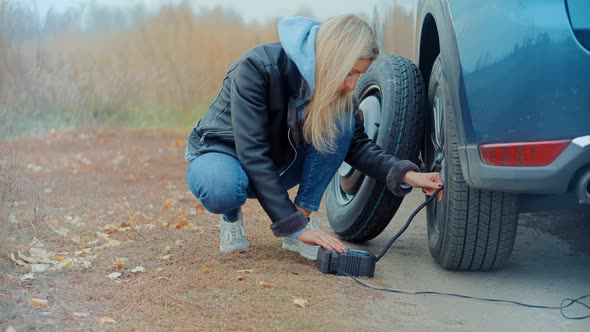 Car Tyre Inflates.Tire Pumping.Checking Tire Pressure.Checking Flat Wheel Filling Air In Tire.