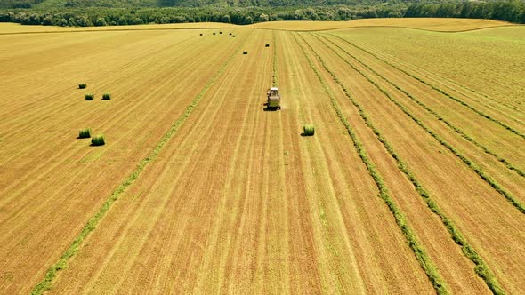 Aerial view of a tractor working on the field