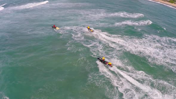 Aerial view of lifeguard surf rescue jet ski personal watercraft in Hawaii