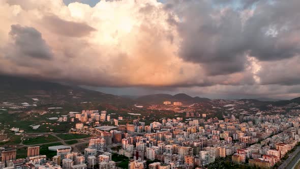 Beautiful cloudy sunset over the sea aerial view 4K