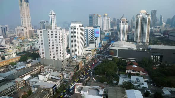 Stream of Cars Moving and Stopping at the Streets of Bangkok Timelapse