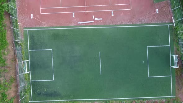 Aerial Over Tennis And Football Courtyard