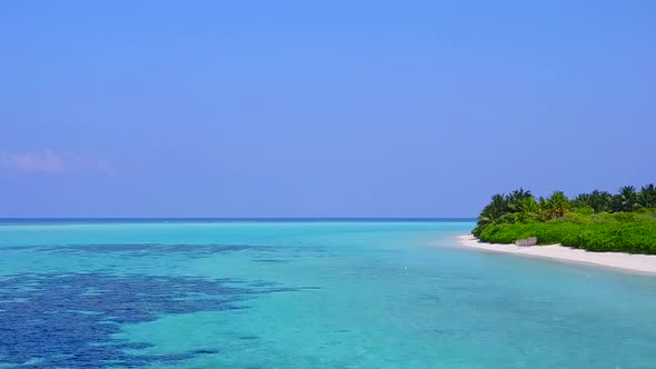 Drone view texture of tourist beach by blue sea and sand background