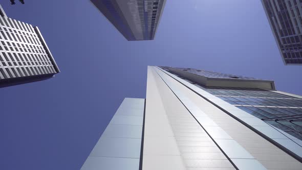 View of skyscrapers at low angle. Look into future. Bottom view