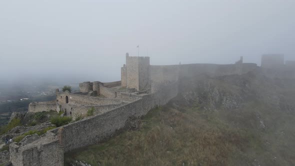 A drone rotates around an ancient medieval castle of Marvão.