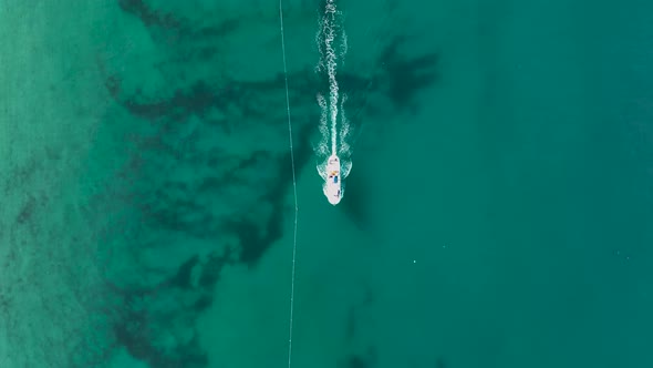 Sunrise Fishing boat goeas to sea aerial view Turkey Alanya 4 K