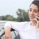 Beautiful Girl Talking on the Phone Near the Car - VideoHive Item for Sale