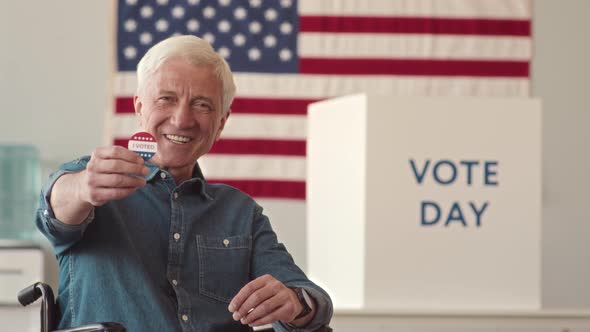 Wheelchaired Senior Man with I Voted Sticker