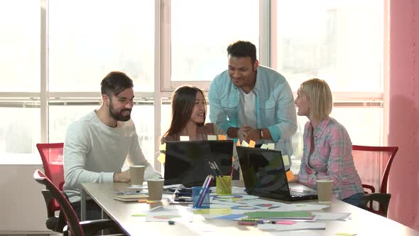 Happy Workers in Office Reaching Success.