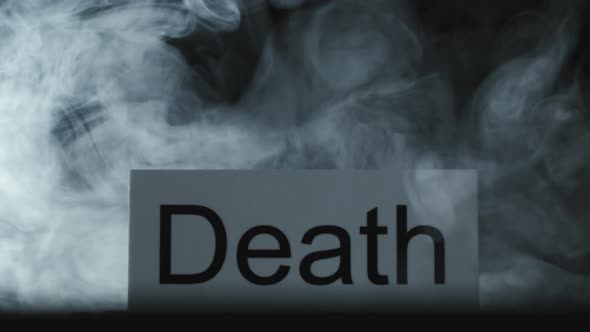 Smoke Flowing Around Word Death