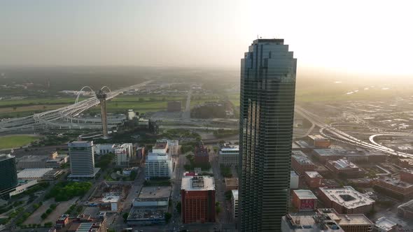 Aerial of Bank of America and Renaissance Towers. Downtown Dallas Texas skyline at dramatic sunset.