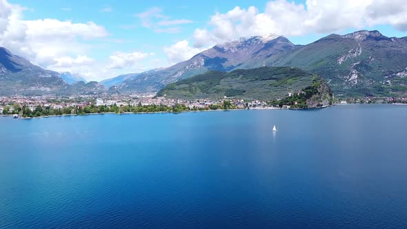 Garda Lake With Mountains And Clouds