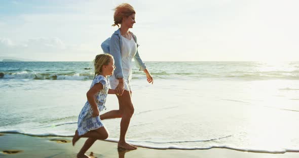 Mother and Daughter at the Beach