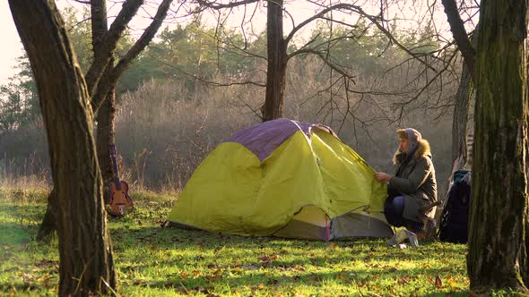 The Guy Sets Up a Tent