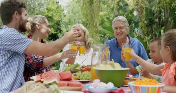 Happy family toasting together