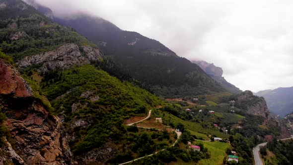 Mountains Forest and Houses