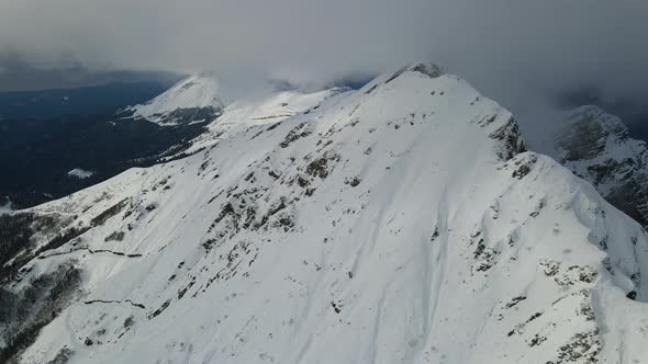 Drone View of the Slopes of the Black Pyramid Mountain in Winter Covered in Snow