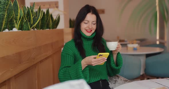 Internet Addiction Woman Uses Phone While Drinking Coffee
