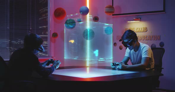 Teens Playing Holographic Game