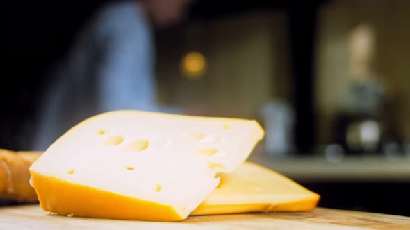 Cheese with Holes on a Retrostyle Cooking Tray