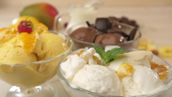 Glass Bowls Filled with Ice Cream with Ice Cream Chocolate Mango and Banana