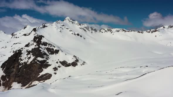 Aerial View from an drone of Beautiful Snowy Caucasus Mountain Landscape in Winter