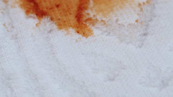 Stain From Spilled Ketchup on White Cloth Closeup