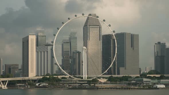 Big Wheel Ferries Wheel in City Day