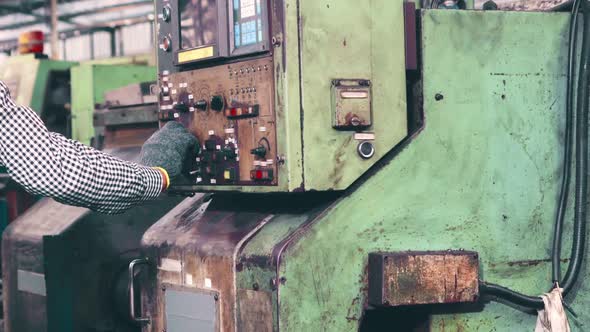 Smart Factory Worker Using Machine in Factory Workshop