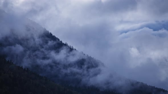 Epic view of misty mountain peak