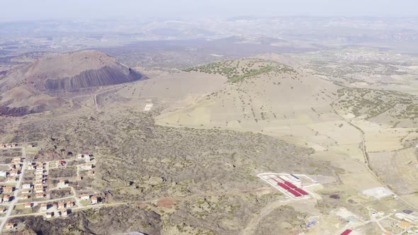 Vast Field And Village Aerial View