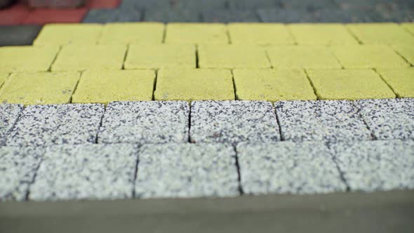 panorama of samples of finished paving stones in the exhibition hall