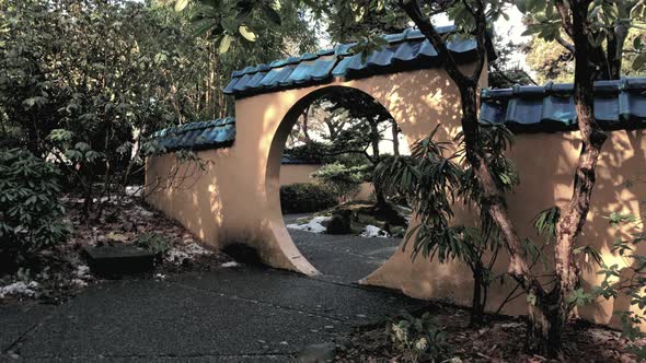 Early spring Park and Tilford Gardens Arch Entrance