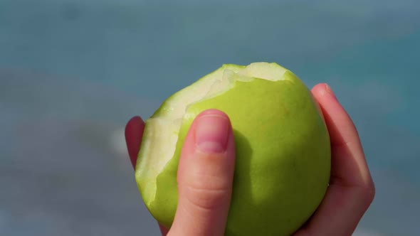 Healthy diet, eating ripe green apple