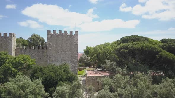 Aerial view of Sao Jorge castle or Saint George's Castle in Lisbon city with river Tejo in backgroun