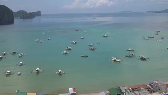 El Nido harbor view from the mountain, features countless amounts of tour boats which ready to depar