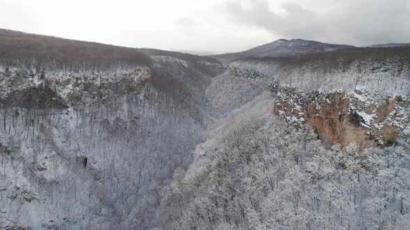 Aerial View of Plateau LagoNaki Mountain Twisted Road in the Winter and Driving Car