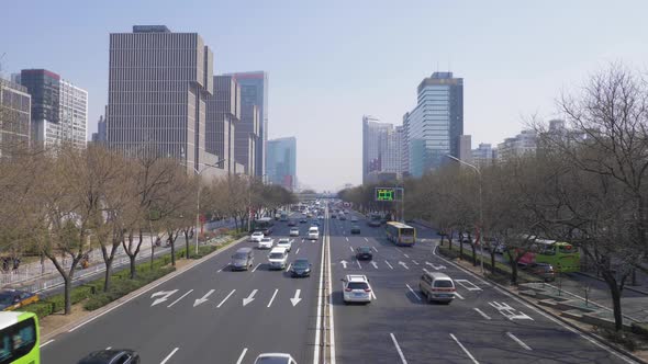 Central Business District in Beijing, China at Clear Day. Skyscrapers and Car Traffic on Highway