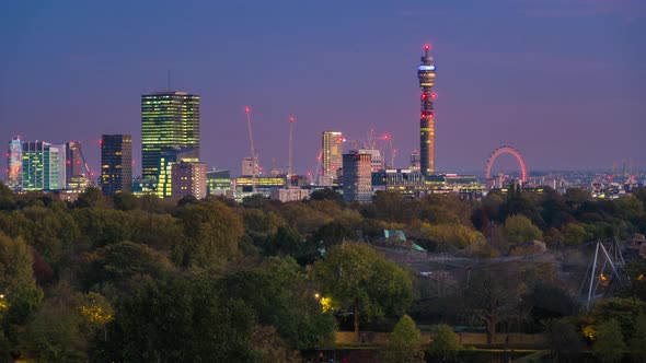 Dusk view of the London skyline from Primrose Hill Park