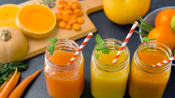 Close Up of Fresh Juices in Mason Jar Glasses 26
