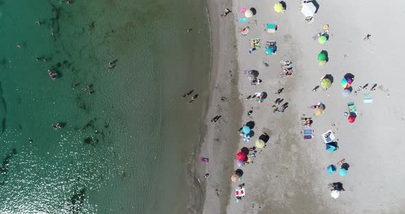 Tropical beach with colorful umbrellas. Holiday concept