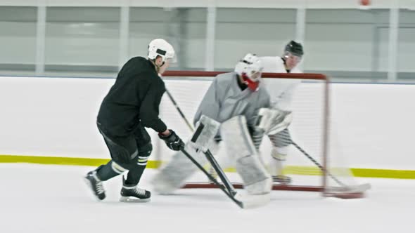 Hockey Players Scoring Goal