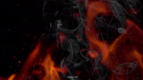 Super Slow Motion Shot of Fire Smoke and Sparks Isolated on Black Background at 1000Fps